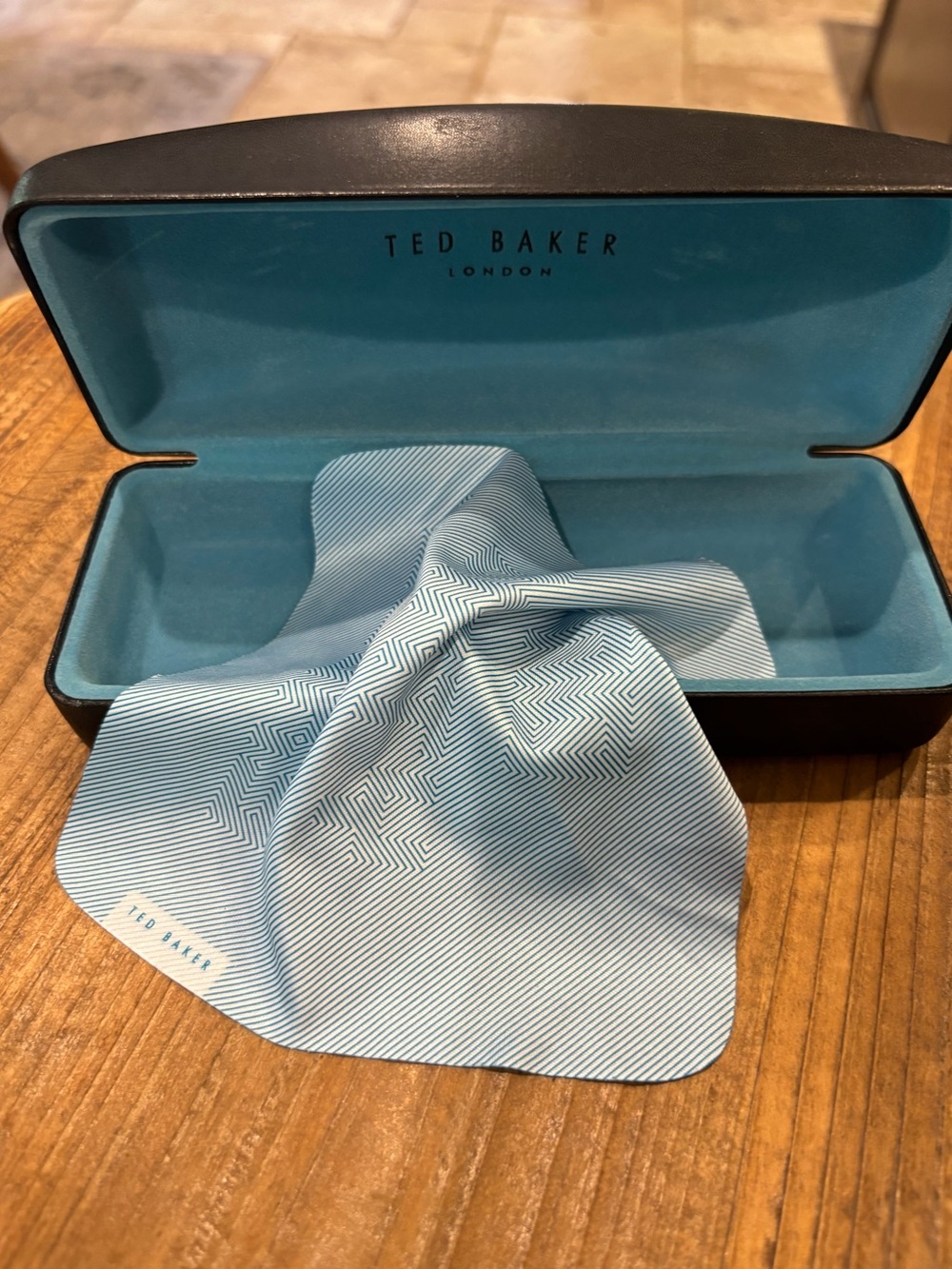Ted Baker faux leather sunglass case with logo lens cleaner